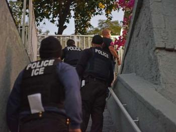 ICE agents executing home arrest